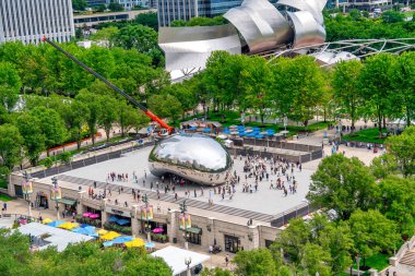 Chicago, IL - July 24, 2024: The Bean (Cloud Gate) is a major city attraction. Aerial view. clipart