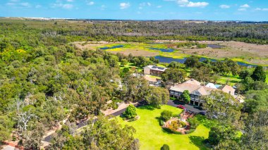 Breathtaking aerial shot of Yanchep National Park, highlighting the lush landscapes and native flora in Western Australia. clipart