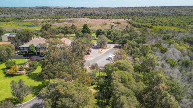 Breathtaking aerial shot of Yanchep National Park, highlighting the lush landscapes and native flora in Western Australia. clipart