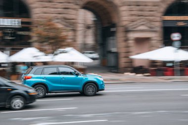 Ukraine, Kyiv - 2 August 2021: Light Blue Suzuki Vitara car moving on the street. Editorial clipart