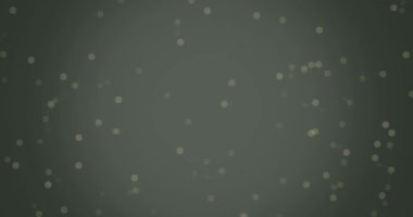 Yuvarlak parlak ışık parçacıkları zeytin zemininde beliriyor ve yavaşça hareket ediyor 