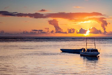 Sunset on the beach of Albion. Albion beach is amongst the most picturesque beaches in Mauritius. Located on the west coast of it is also home to the iconic Lighthouse of Albion.