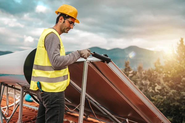 Man Works Renewable Energy Solar Panel Hot Water — Stock Fotó