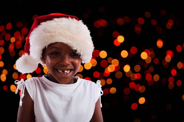 Kafasında Noel Şapkası Olan Küçük Kız — Stok fotoğraf