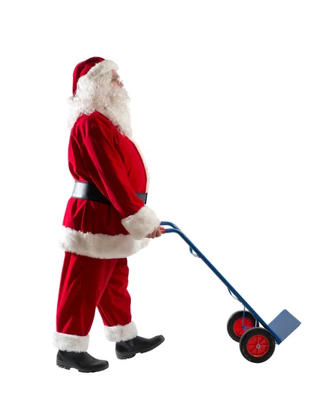 Papai Noel Empurra Carrinho Para Transportar Pacotes Para Entregar — Fotografia de Stock