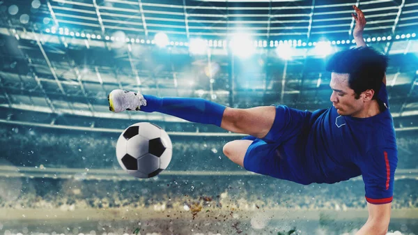 Football player kicks a soccerball at the stadium
