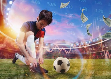 Soccer player ties his shoes ready to play at the stadium. Online soccer bet