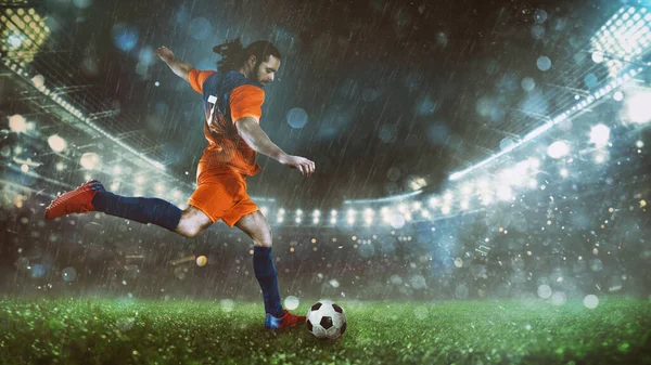サッカー選手はスタジアムで精力的にボールをキック — ストック写真