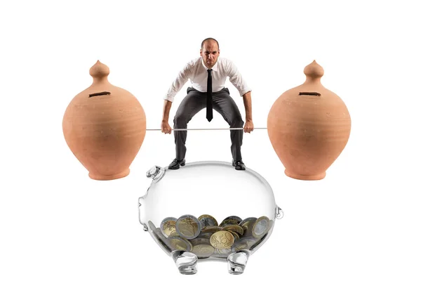 Powerful Determined Man Trains Barbell Piggy Banks — Stock Photo, Image