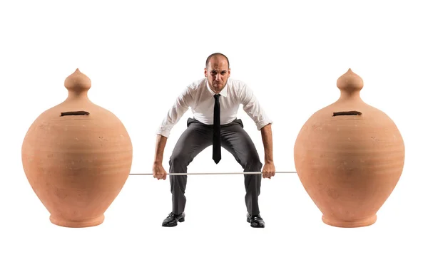 Powerful Determined Man Trains Barbell Piggy Banks — Stock Photo, Image