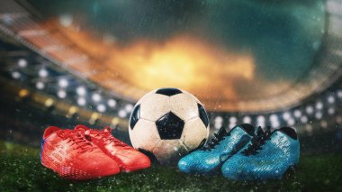 Futbol topunun önünde iki rakip takım