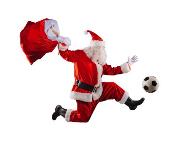 santa claus runs fast with a soccer ball in a football match