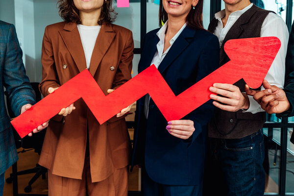 Business People Hold Red Arrow Growing Successful Profit Concept Royalty Free Stock Photos