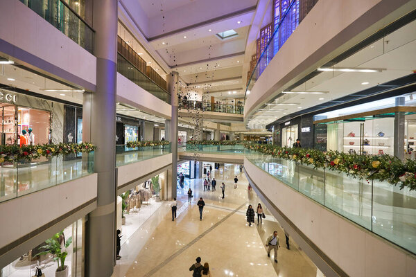 HONG KONG - CIRCA DECEMBER, 2019: interior shot of IFC Mall, an 4-storey luxury shopping mall, with many luxury retail brands and wide variety of restaurants.