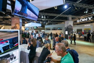 COLOGNE, GERMANY - CIRCA SEPTEMBER, 2018: atmosphere at Sony space in Photokina Exhibition. Photokina is a trade fair held in Europe for the photographic and imaging industries. clipart