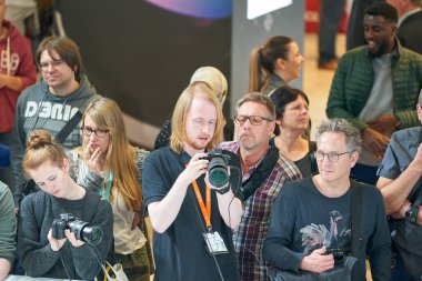 COLOGNE, GERMANY - CIRCA SEPTEMBER, 2018: atmosphere at Sony space in Photokina Exhibition. Photokina is a trade fair held in Europe for the photographic and imaging industries. clipart