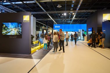 COLOGNE, GERMANY - CIRCA SEPTEMBER, 2018: Nikon space at Photokina Exhibition. Photokina is a trade fair held in Europe for the photographic and imaging industries. clipart