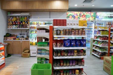 KUALA LUMPUR, MALAYSIA - CIRCA MARCH, 2023: inside KK Super Mart convenience store in Kuala Lumpur. KK Super Mart is a convenience store chain in Malaysia clipart