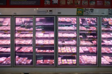 BANGKOK, THAILAND - CIRCA APRIL, 2023: chilled meat on display at Big C Supercenter Ratchadamri in Bangkok.  clipart