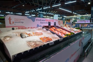 BANGKOK, THAILAND - CIRCA APRIL, 2023: chilled fish on display at Big C Supercenter Ratchadamri in Bangkok.  clipart