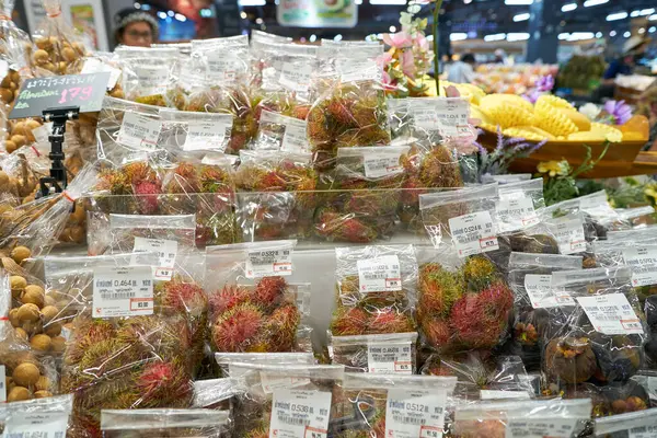 stock image BANGKOK, THAILAND - CIRCA APRIL, 2023: rambutans on display at Big C Supercenter Ratchadamri in Bangkok. 