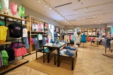 HO CHI MINH CITY, VIETNAM - CIRCA MARCH, 2023: interior shot of OVS store in Crescent Mall. clipart