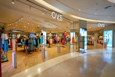 HO CHI MINH CITY, VIETNAM - CIRCA MARCH, 2023: entrance to OVS store in Crescent Mall. clipart