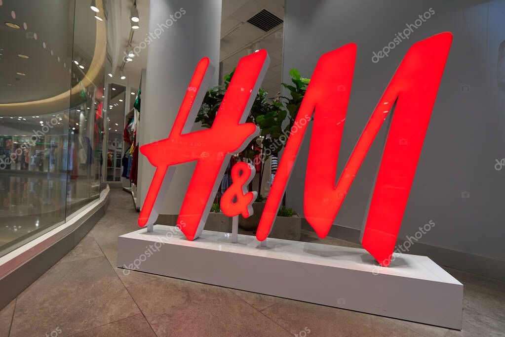 HO CHI MINH CITY, VIETNAM - CIRCA MARCH, 2023: H and M sign seen at the store in Crescent Mall