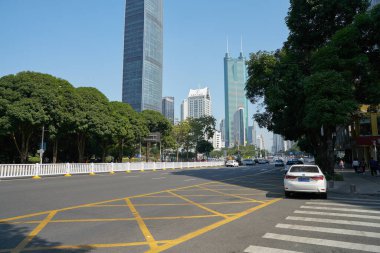 SHENZHEN, CHINA - NOVEMBER 20, 2019: street level view of Shenzhen in the daytime.  clipart