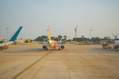 HO CHI MINH CITY, VİETNAM - 24 Mart 2023: Tan Son Nhat Uluslararası Havaalanı Vietnam Havayolları Airbus A321.