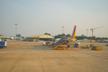 HO CHI MINH CITY, VİETNAM - 24 Mart 2023: Tan Son Nhat Uluslararası Havaalanı Vietnam Havayolları Airbus A321.