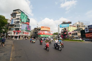 HO CHI MINH CITY, VİETNAM - 25 Mart 2023: Ho Chi Minh şehrinin sokak manzarası.