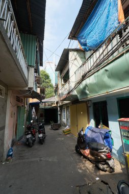 HO CHI MINH CITY, VİETNAM - 25 Mart 2023: Ho Chi Minh City 'de bir ara sokak.