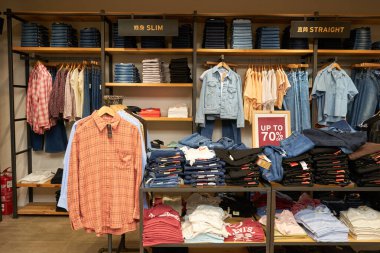 KUALA LUMPUR, MALAYSIA - MAY 26, 2023: interior shot of Levi's store in Berjaya Times Square Kuala Lumpur. clipart