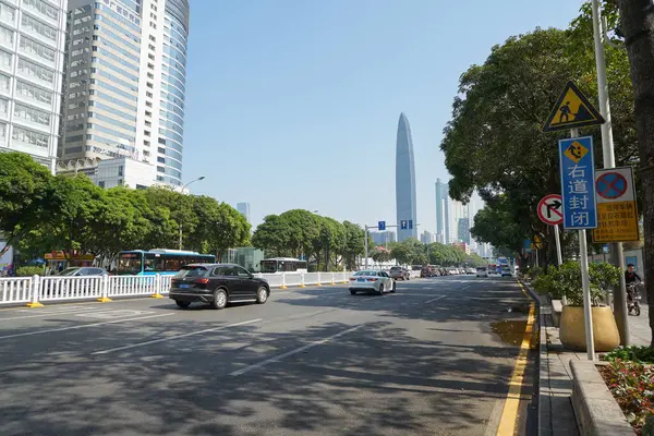 stock image SHENZHEN, CHINA - NOVEMBER 20, 2019: street level view of Shenzhen in the daytime. 