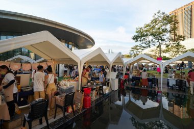 KUALA LUMPUR, MALAYSIA - CIRCA MAY, 2023: pop-up market in the Central Rooftop Garden located at Level 4 of Mitsui Shopping Park LaLaport BBCC. clipart