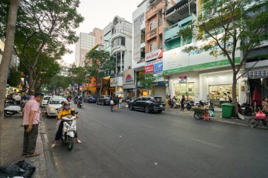 HO CHI MINH CITY, VİETNAM - 25 Mart 2023: Ho Chi Minh şehrinin sokak manzarası.