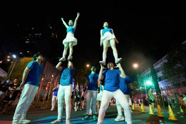 HO CHI MINH CITY, VİETNAM - 26 Mart 2023: Ho Chi Minh City 'deki Gençlik Festivali 2023' te akrobatik performans.