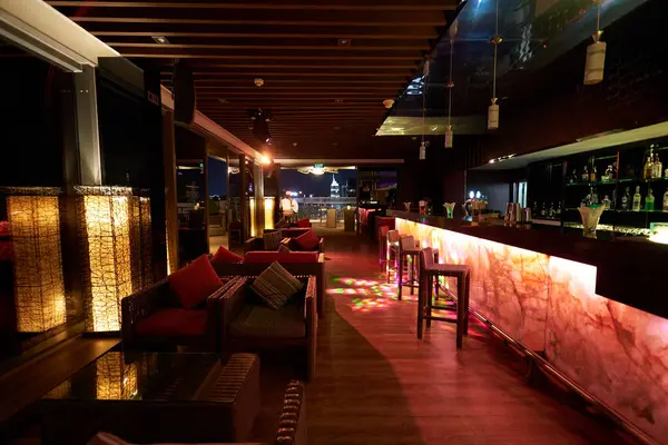 stock image HO CHI MINH CITY, VIETNAM - MARCH 26, 2023: interior shot of OnTop Bar, a rooftop bar located on the 20th floor at Novotel Saigon Centre.