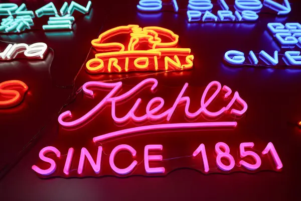 stock image SHENZHEN, CHINA - NOVEMBER 21, 2019: close up shot of brand signs on a wall of Maoye Mall in the night.