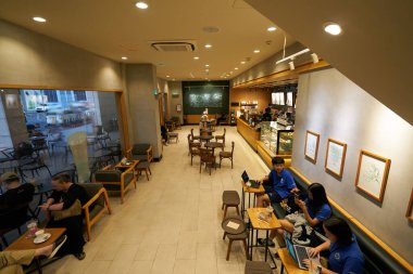 HO CHI MINH CITY, VİETNAM - 29 Mart 2023: Starbucks Kahve 'nin iç çekimleri.
