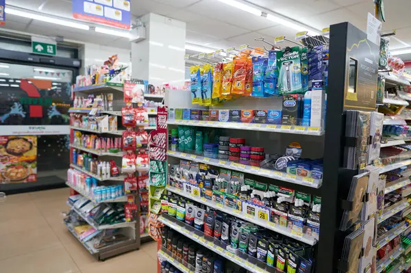 stock image PHUKET, THAILAND - APRIL 15, 2023: non-food products on display inside 7-Eleven convenience store in Phuket.