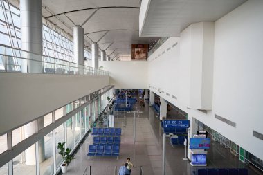 HO CHI MINH CITY, VIETNAM - MARCH 30, 2023: interior shot of Tan Son Nhat International Airport. clipart