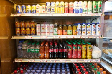 HO CHI MINH CITY, VIETNAM - MARCH 30, 2023: drinks on display at Star Cafe inside Tan Son Nhat International Airport. clipart