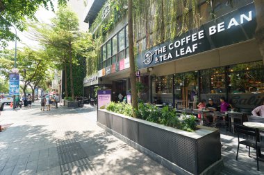 HO CHI MINH CITY, VİETNAM - 26 Mart 2023: Ho Chi Minh City 'deki Kahve Fasulyesi ve Arakçı Yaprağı sokak manzarası.