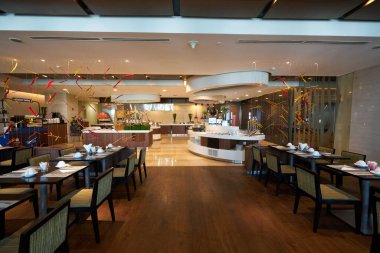 HO CHI MINH CITY, VİETNAM - 26 Mart 2023: Novotel Saigon Centre 'daki restoranın iç çekimi.