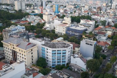 HO CHI MINH CITY, VIETNAM - MARCH 26, 2023: Ho Chi Minh City urban landscape clipart