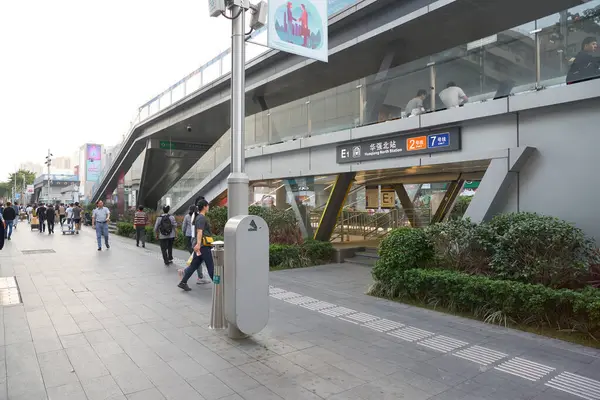 stock image SHENZHEN, CHINA - NOVEMBER 21, 2019: Huaqiang North Station entrance in the evening.