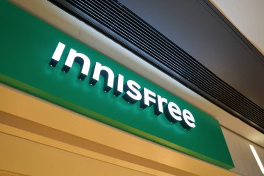 HONG KONG, CHINA - DECEMBER 04, 2023: Innisfree sign as seen in New Town Plaza shopping mall. Innisfree is a South Korean cosmetics brand clipart