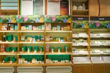 HONG KONG, CHINA - DECEMBER 04, 2023: cosmetic products displayed at Innisfree store in New Town Plaza shopping mall. Innisfree is a South Korean cosmetics brand clipart